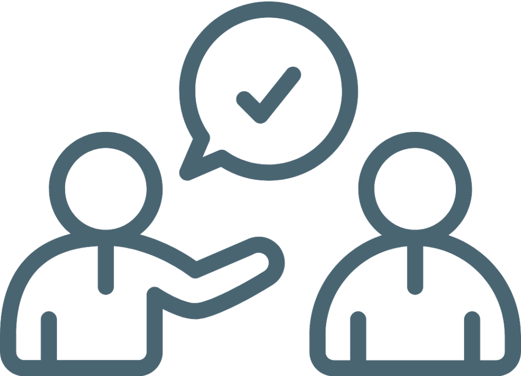 Icono de dos personas dándose la mano con un bocadillo de diálogo y un check, representando acuerdo o comunicación efectiva.